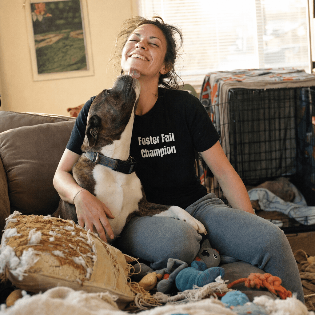 Person laughing with their rescue dog